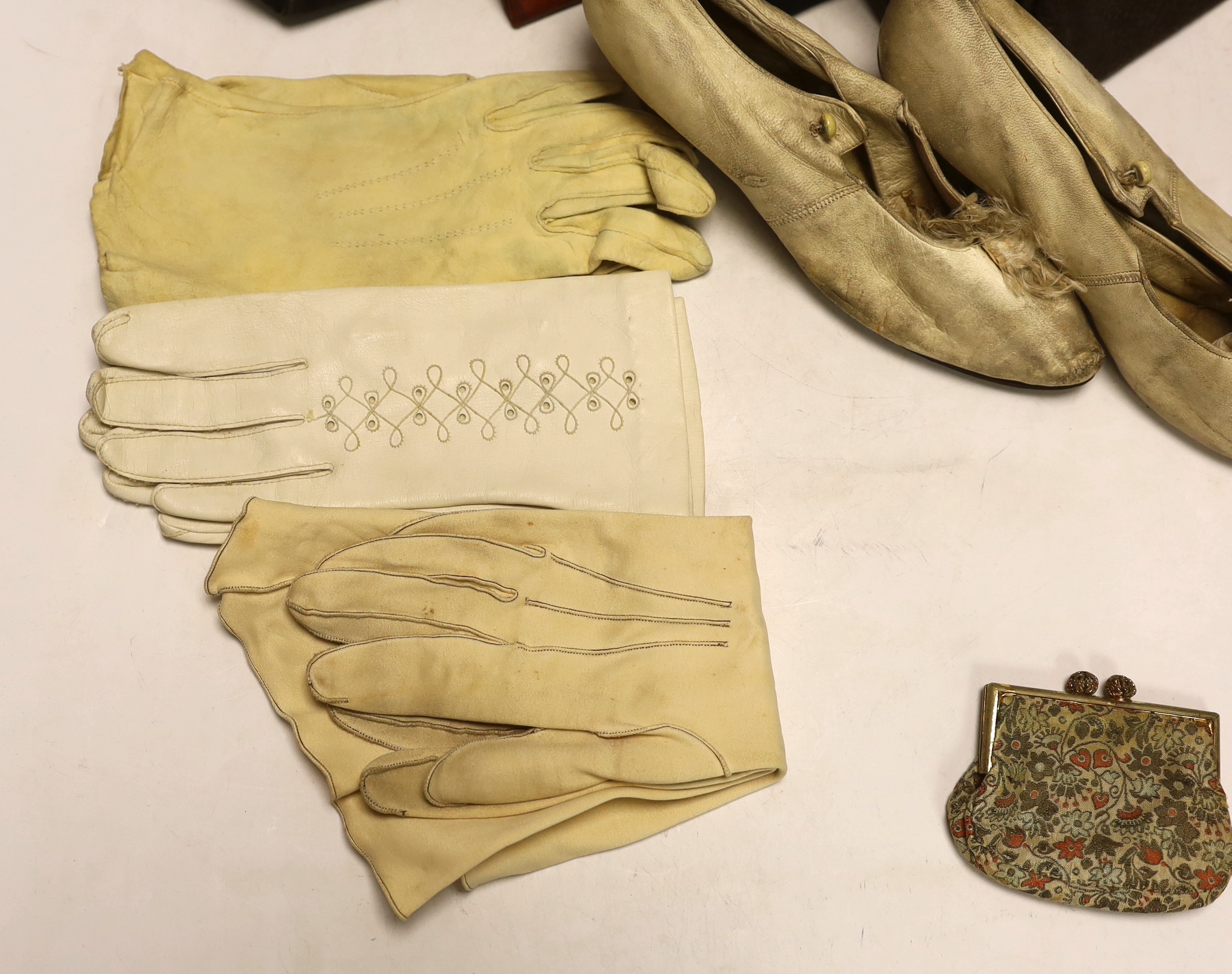 A pair of ladies Edwardian cream silk shoes, a snakeskin handbag, a 1940's clutch bag, etc.